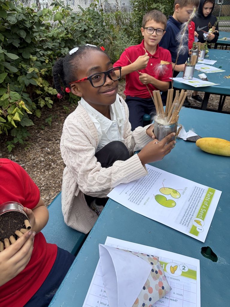 Student holding a solitary bee home.
