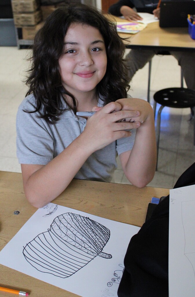 female student with drawing