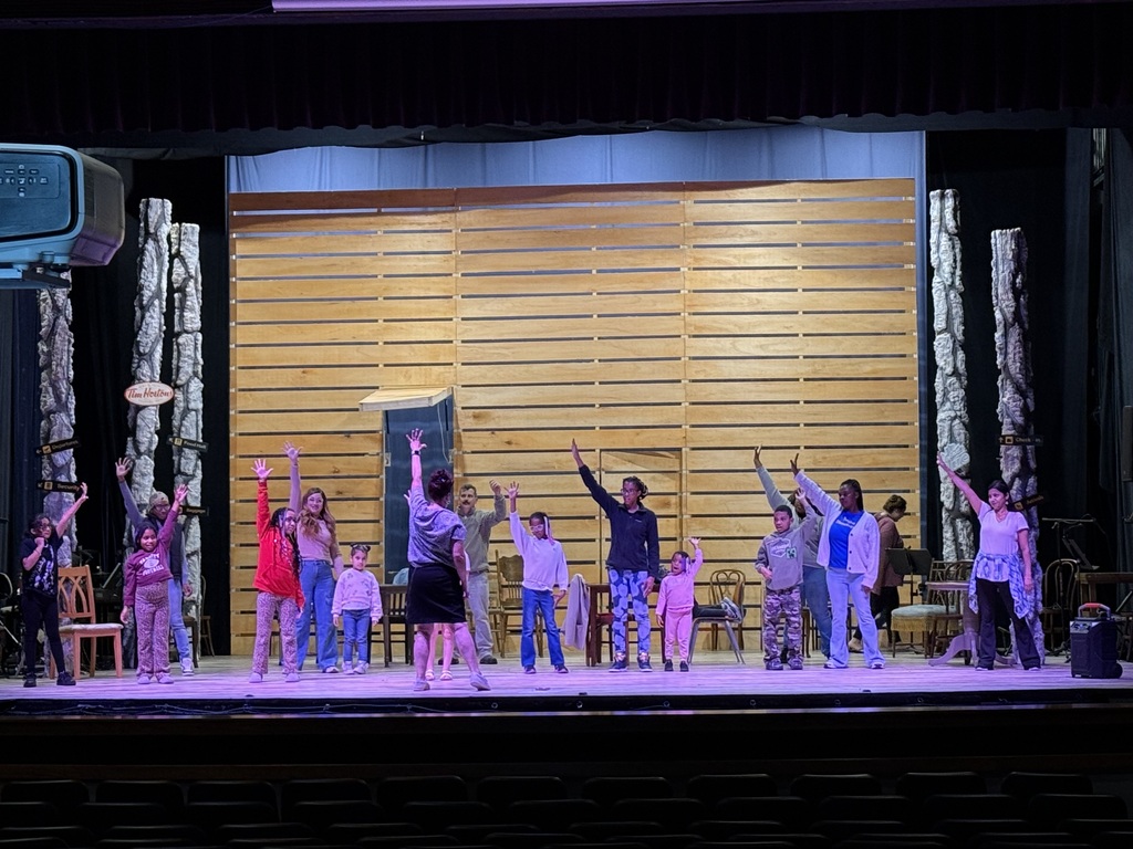 Families on stage at the Playhouse 