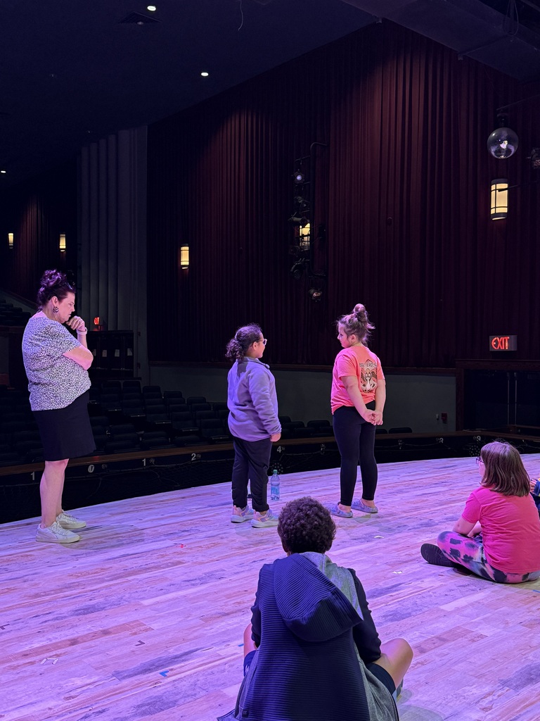 Families on stage at the Playhouse