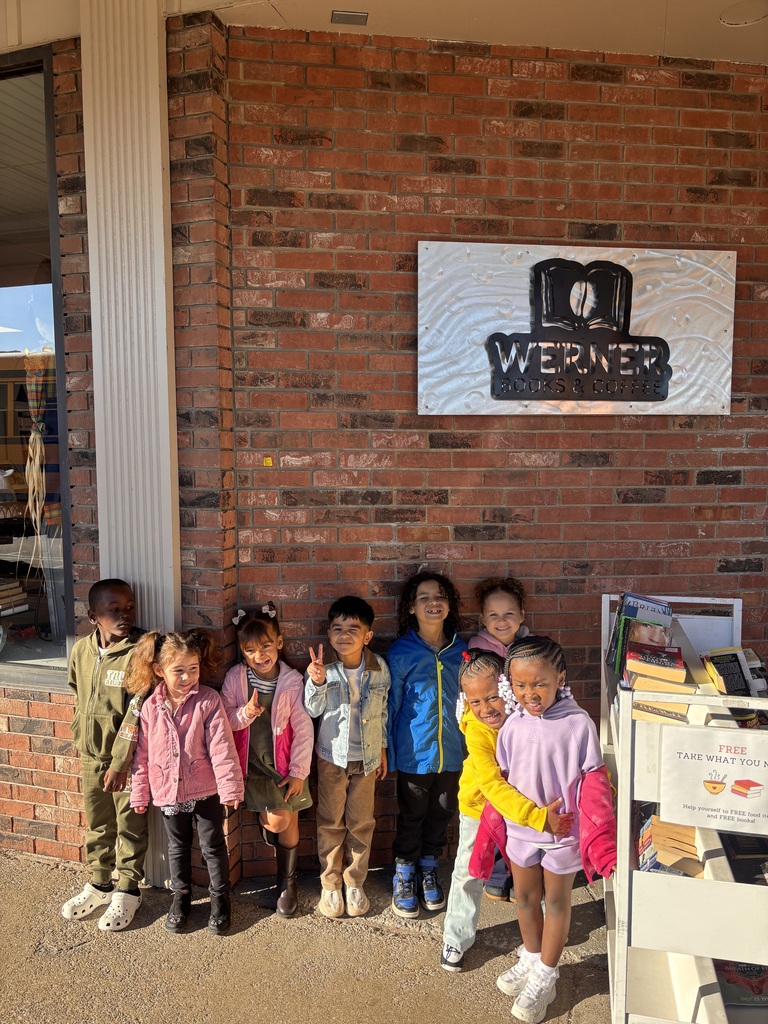 Students in front of the Werner Books sign