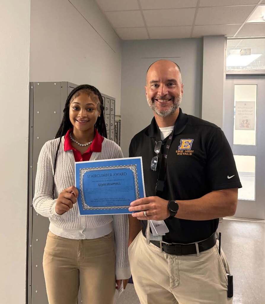 Stairclimber award winner A'Zari with Principal Orlando.