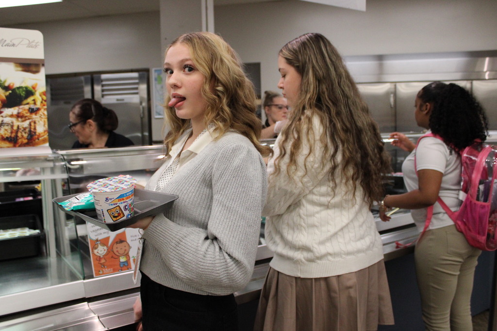 female students with breakfast