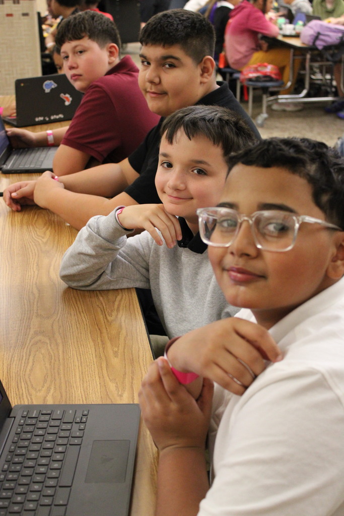 students sitting at a table