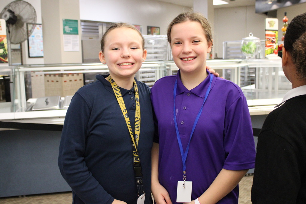 2 female students smiling
