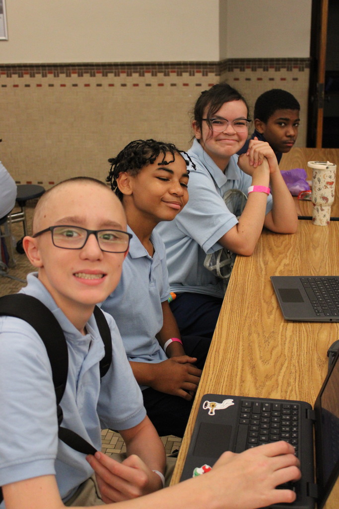 students sitting at a table