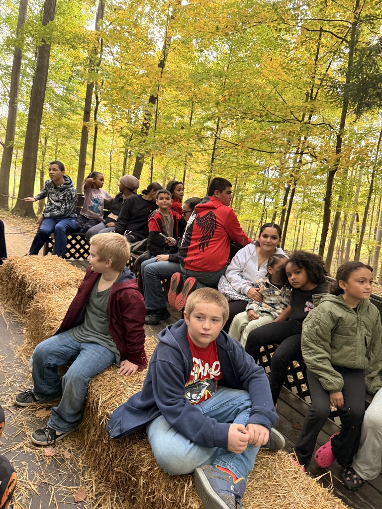 Students and families on the tractor ride