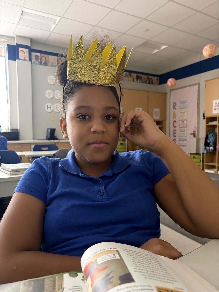 Female student wearing a crown