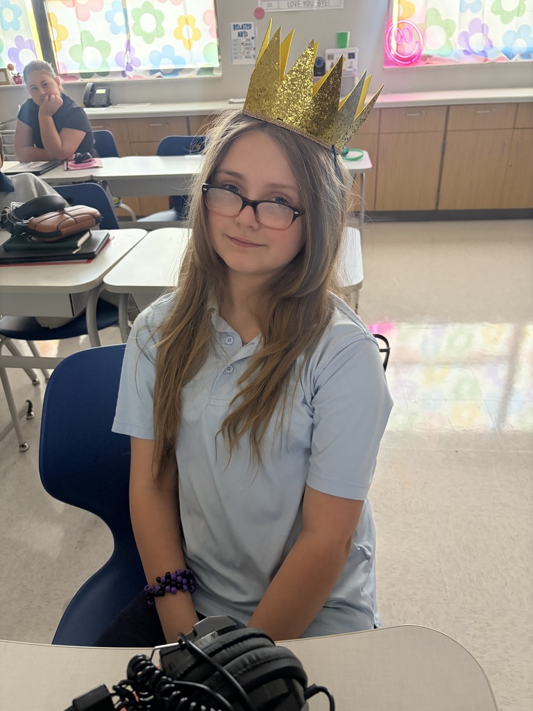 Female student wearing a crown
