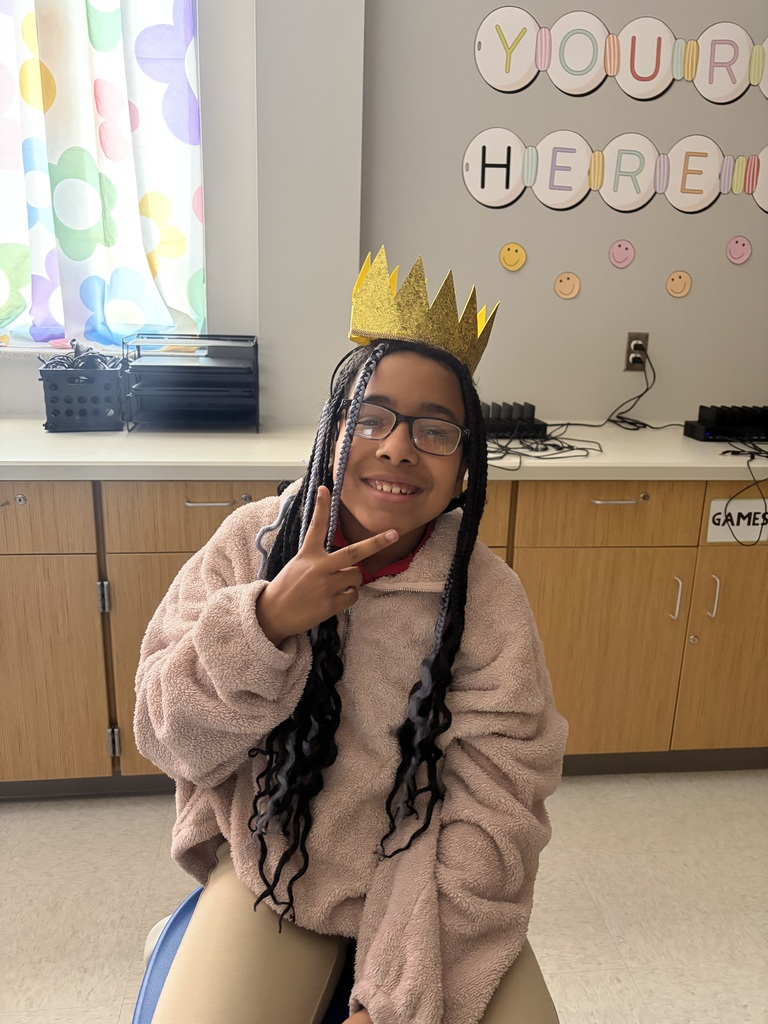 Female student wearing a crown