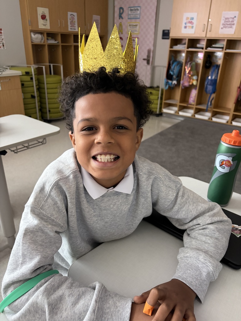 Male student wearing a crown