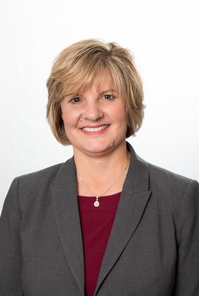 Dr. Michele W. Collier, Superintendent of Escambia County Schools smiling in a professional headshot