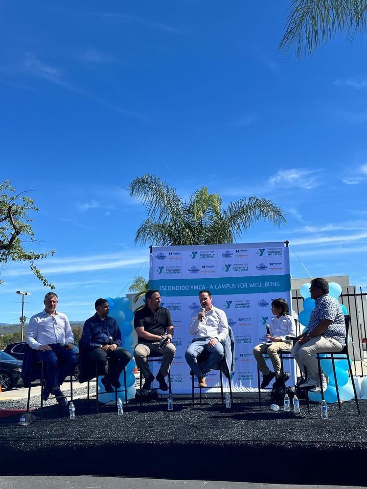 YMCA, EUSD, and partners present on stage.