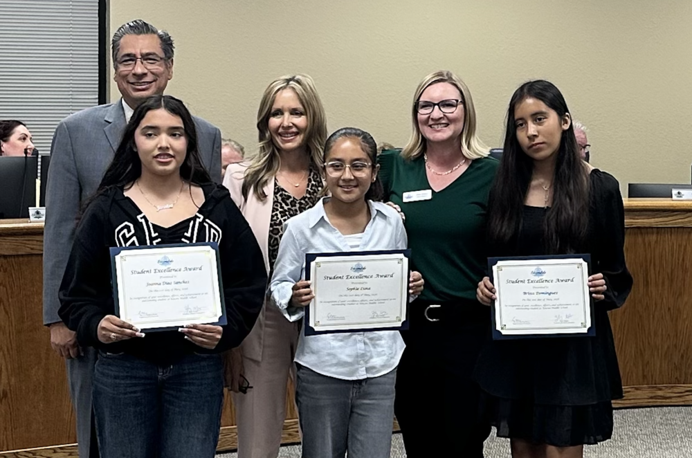 Excellence award winners at board meeting with Dr. Ibarra, Principal Meglich, and EUSD board president, Zesty Harper