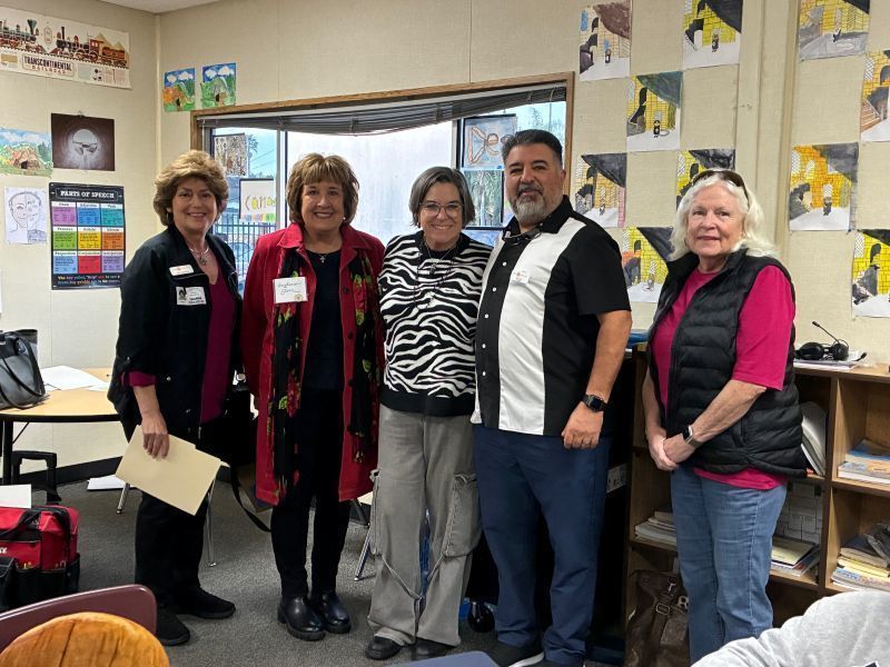 Volunteer Nancy Narron receives the "Caring Hearts" Award.