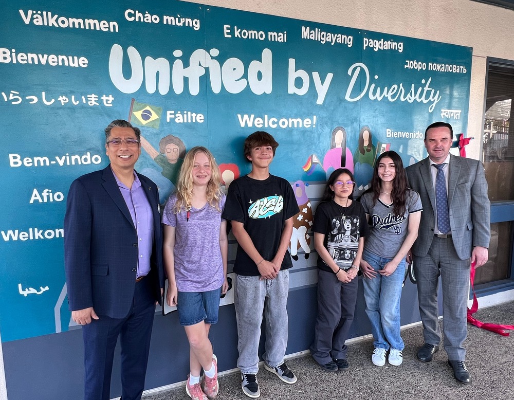 Ribbon cutting for mural dedication