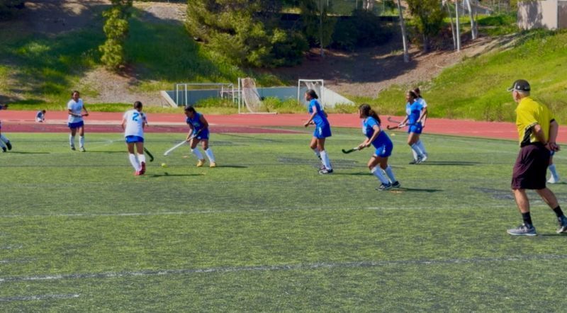 Del Dios Field Hockey students participate in the championship game.