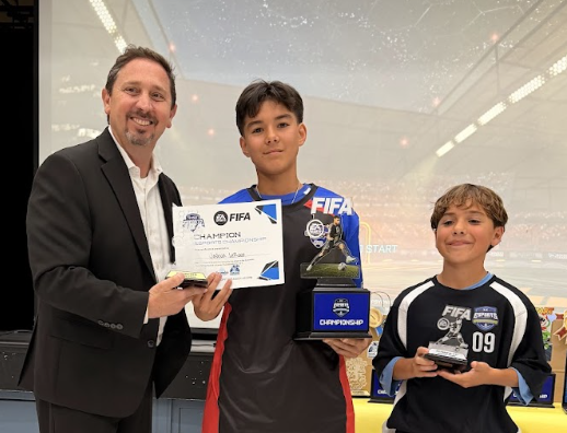 Rick Oser with Esport Champion students