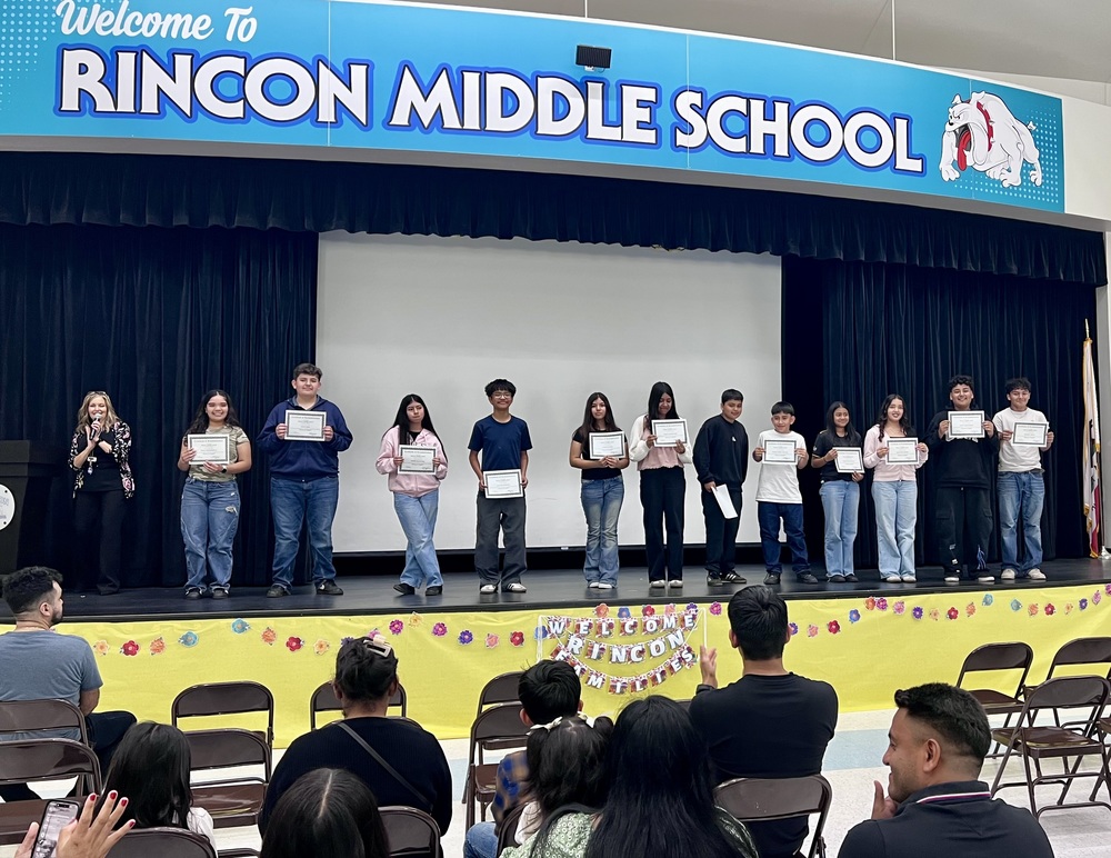 18 students recognized for achieving reclassification. 