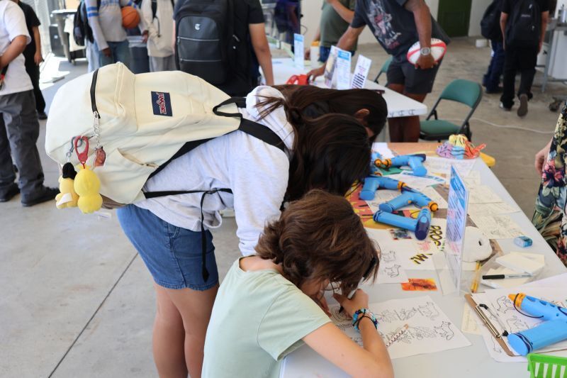 Del Dios Academy of Arts and Science students sign up for EXPLORE classes during rush week!