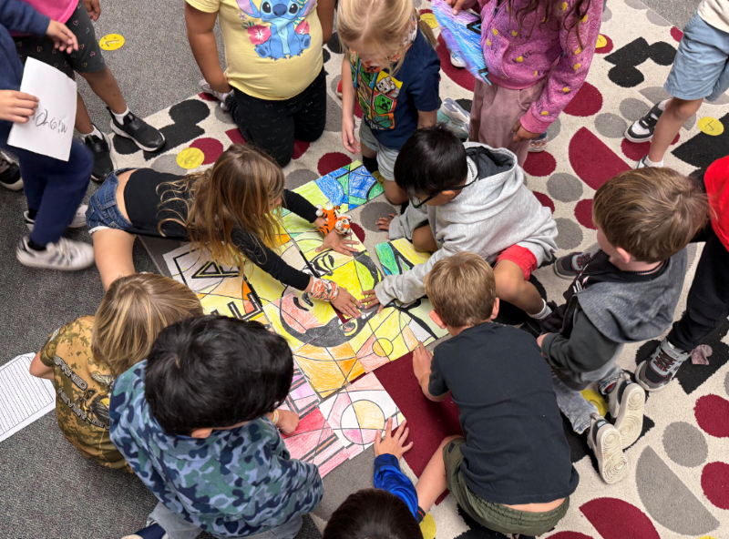Students work on a project depicting Martin Luther King Jr.