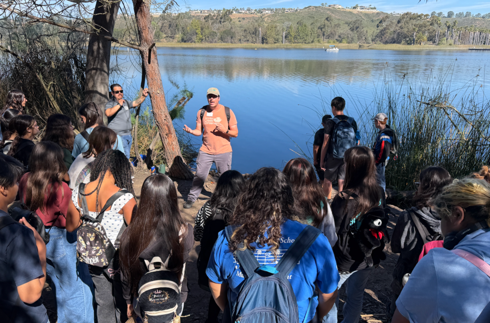 8th graders at trout release at Miramar Lake