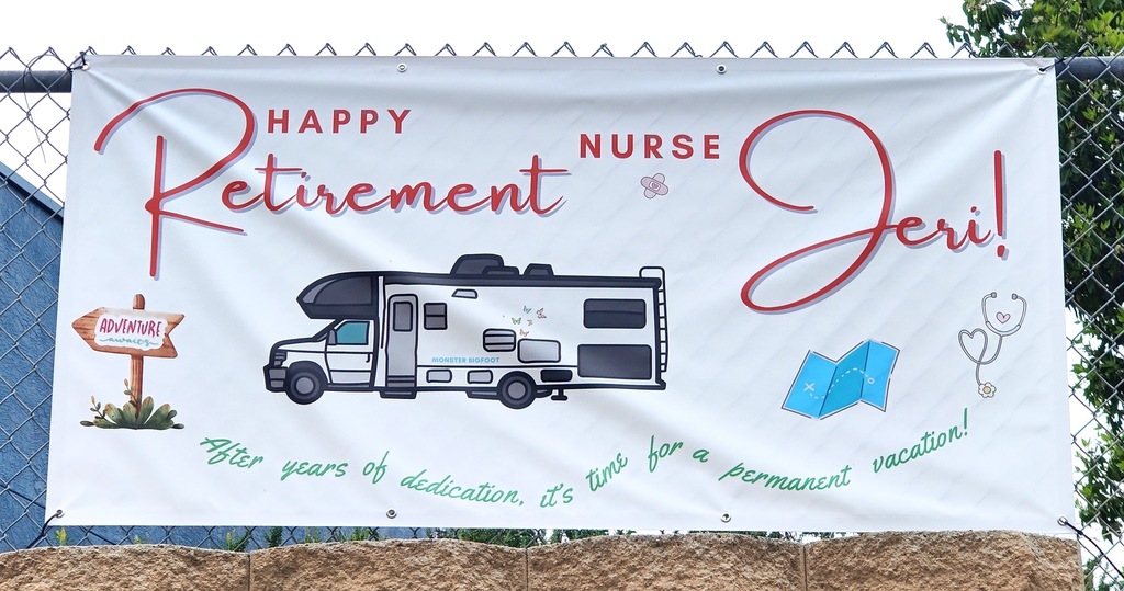 Retirement banner with a travel trailer for Ms. Jeri