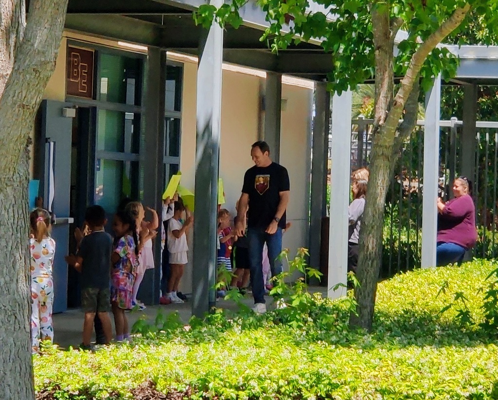 Mr. Lyche being clapped out by TK students