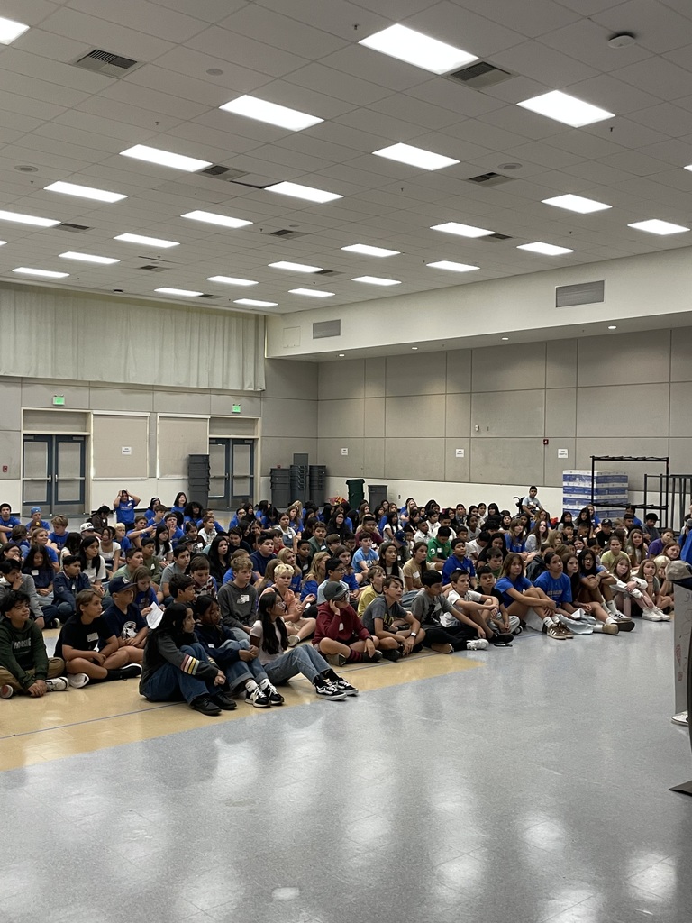 Students listening to WEB speaker