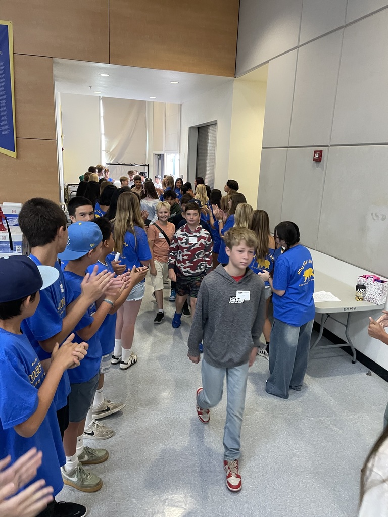 Students being greeted by WEB leaders