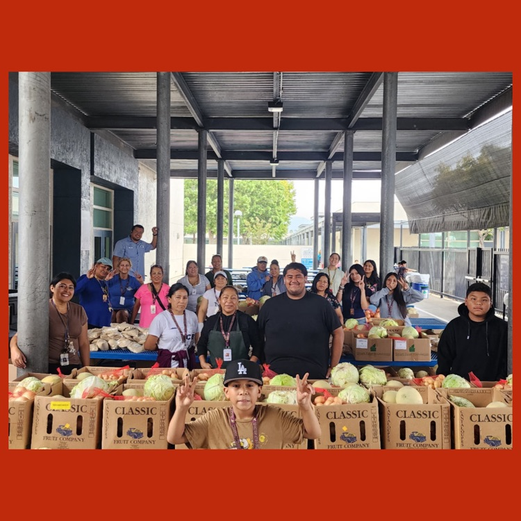 A group photo of all of the volunteers at August’s Food Distribution