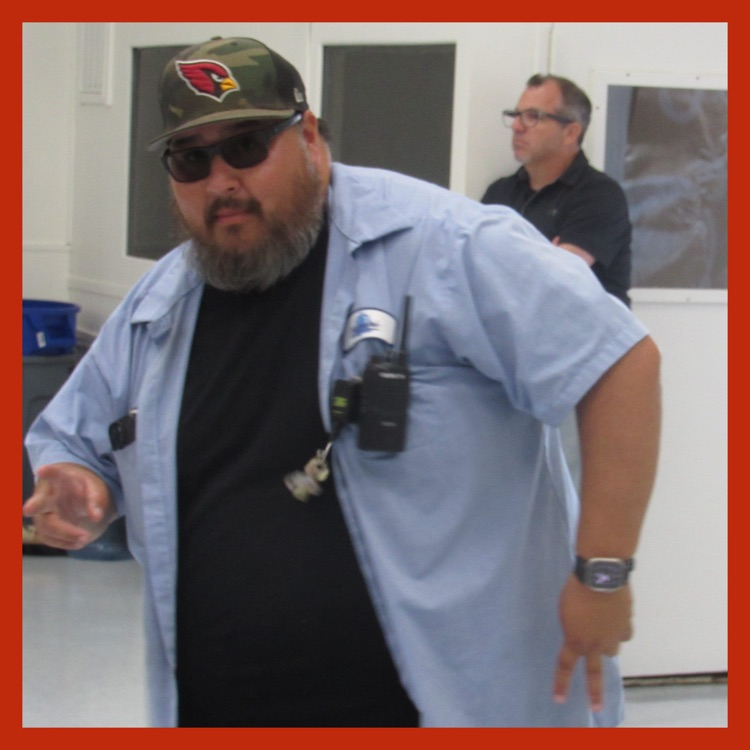 An action shot of our awesome custodian, Mr. Mikey, as a stoic Mr. Kirshen looks on and wonders "How many more years before retirement?"