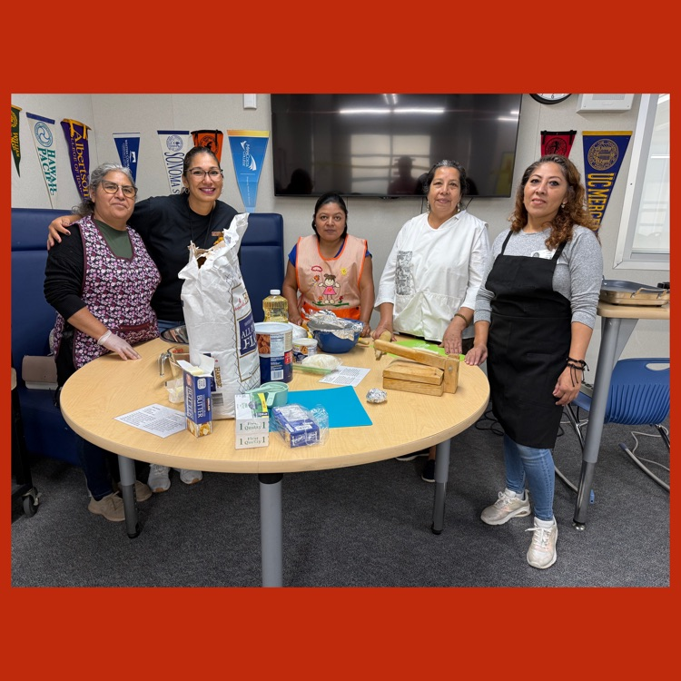 A group photo of Mrs. Valle, our Family Liaison, with the Wildcat parents who came to make tortillas for our 7th Grade students