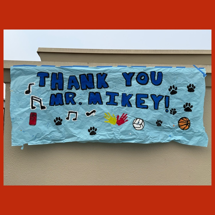 A banner made by ASB that says "Thank You Mr. Mikey" on it