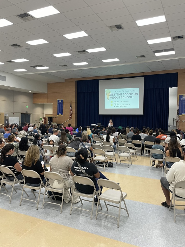 Families listening to a presentation