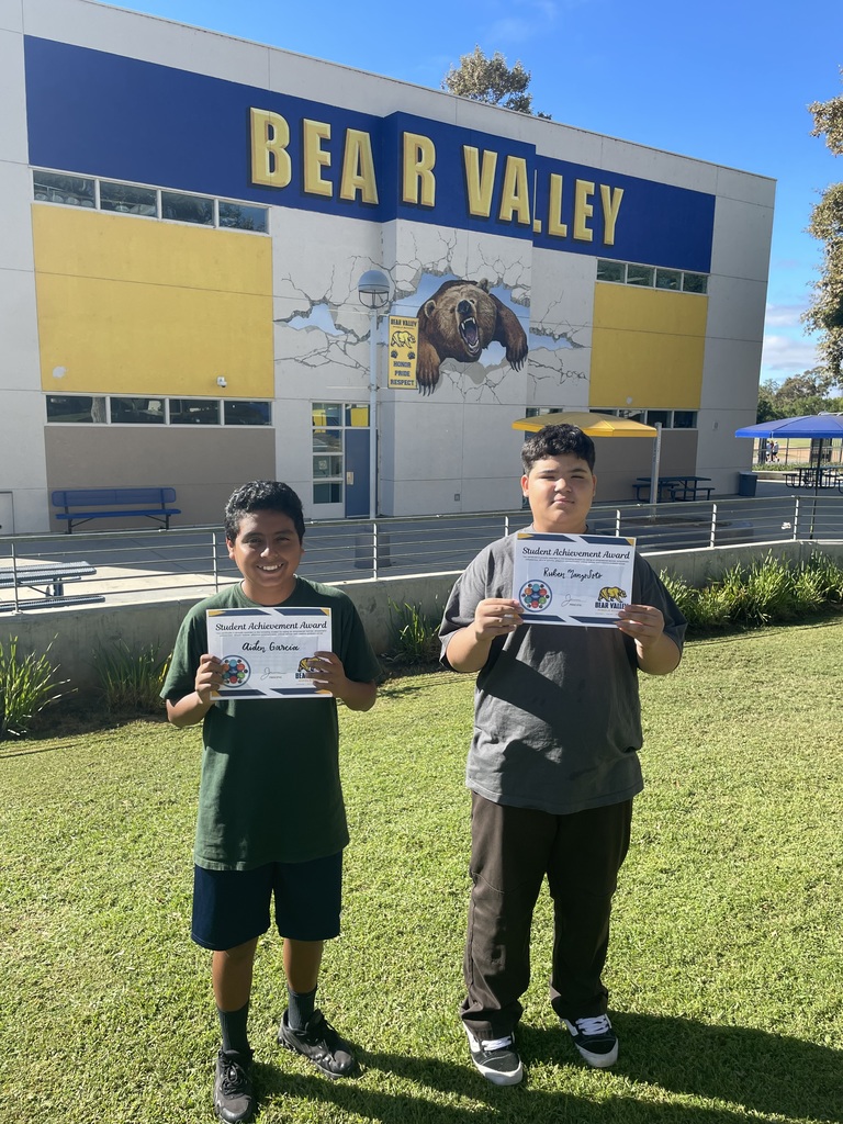 Students holding awards