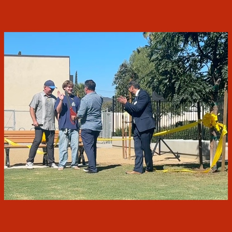 The ribbon-cutting dedicating Tamara's Memorial Bench and Tree featuring Jason Hoff, Tamara's son, Jacob, Tamara's husband, Ali, and Dr. Ibarra