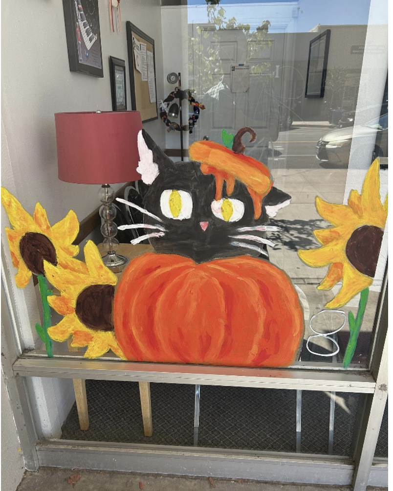 Picture of student Halloween art work on a window