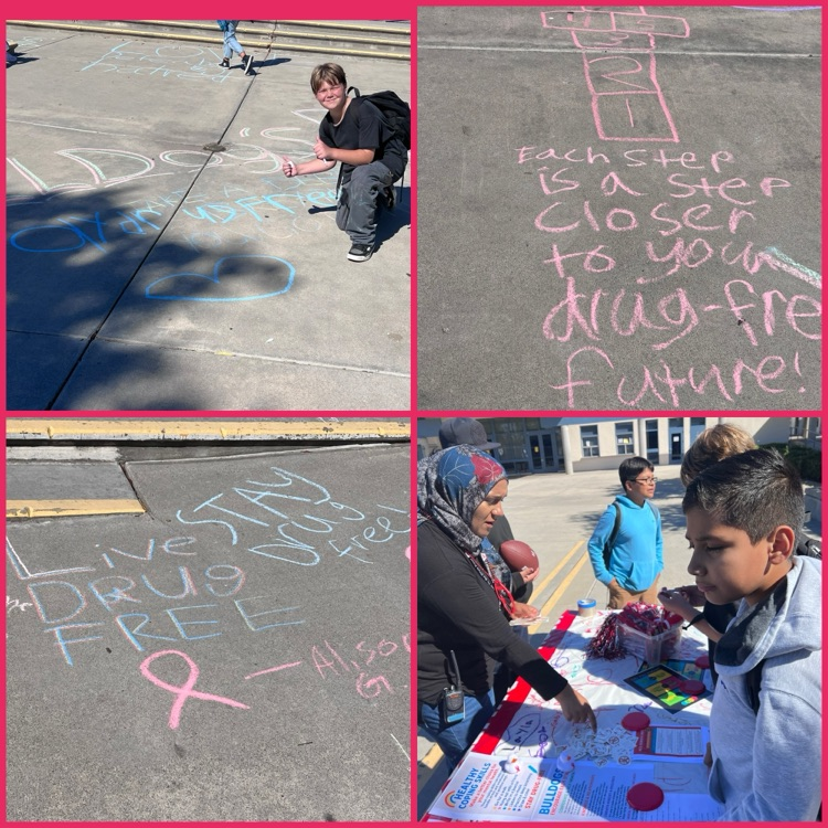 Students writing positive messages. 