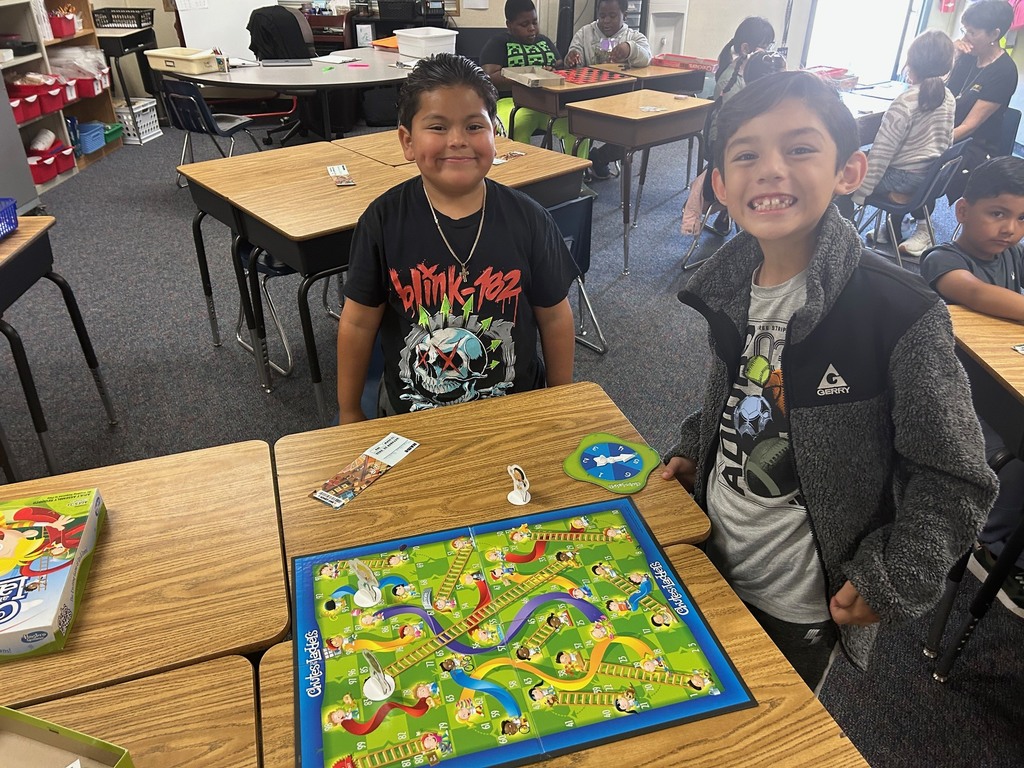 Students playing a board game