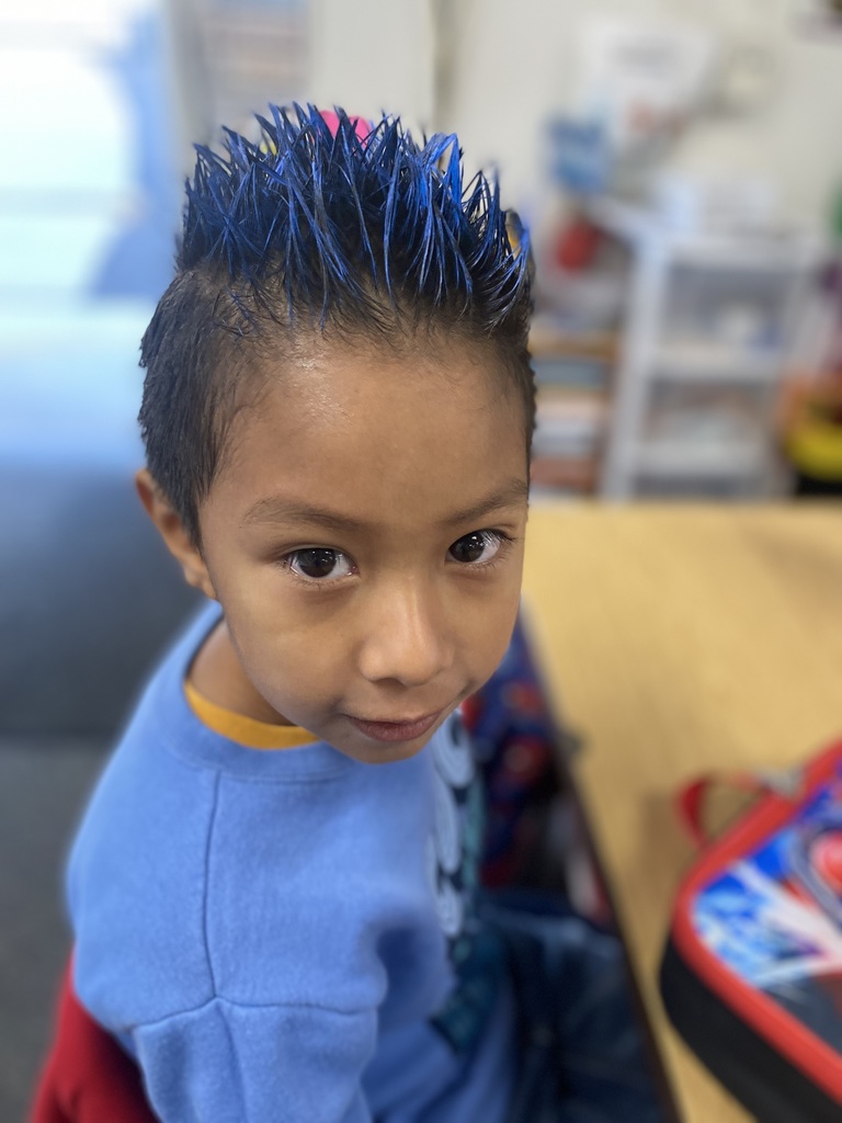 student with blue hair