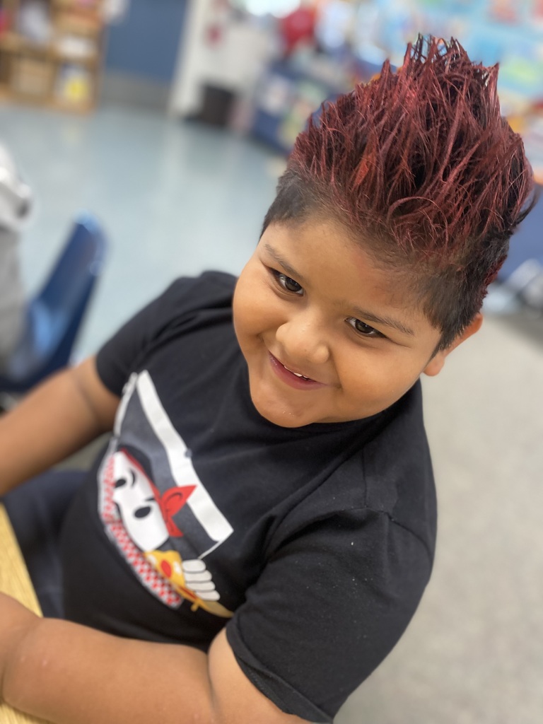 student with fiery red hair