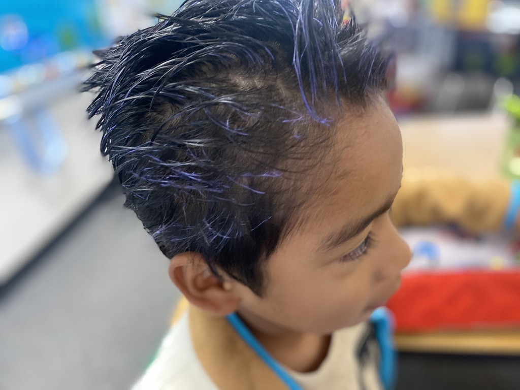 student with purple hair