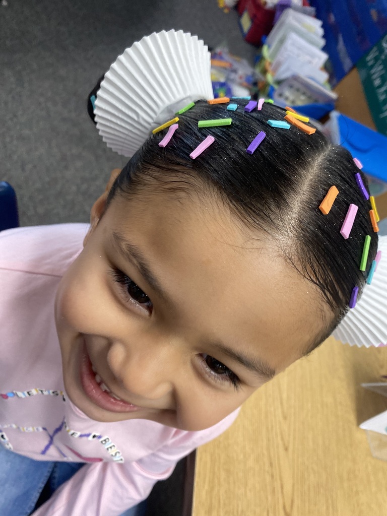 student with sprinkles in hair
