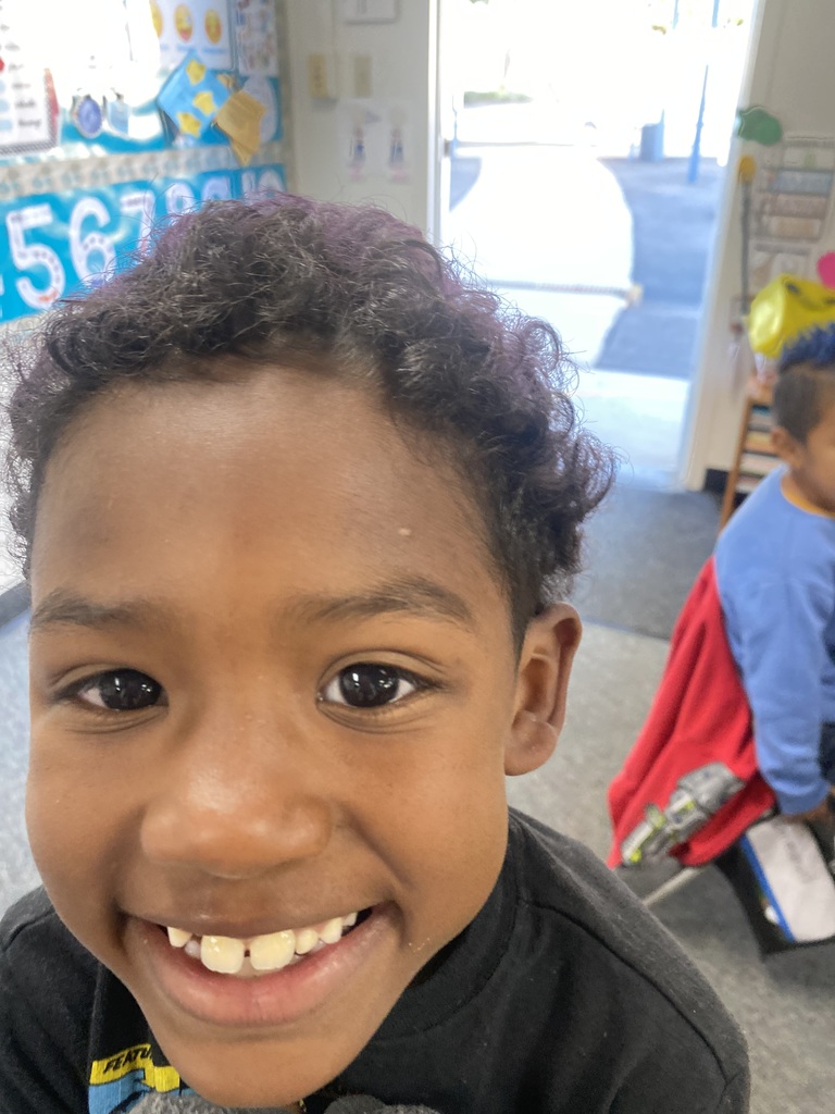 student with purple hair