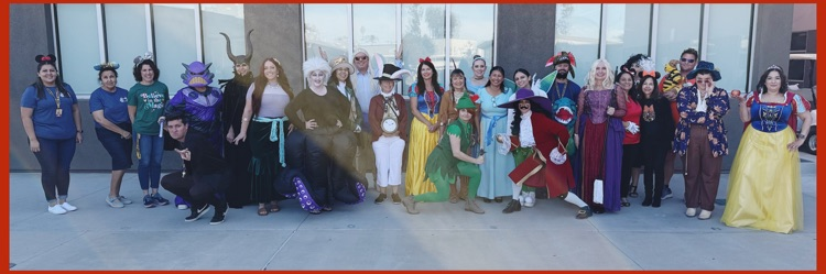 A Halloween group photo of the Mission Faculty, Staff, and Admin