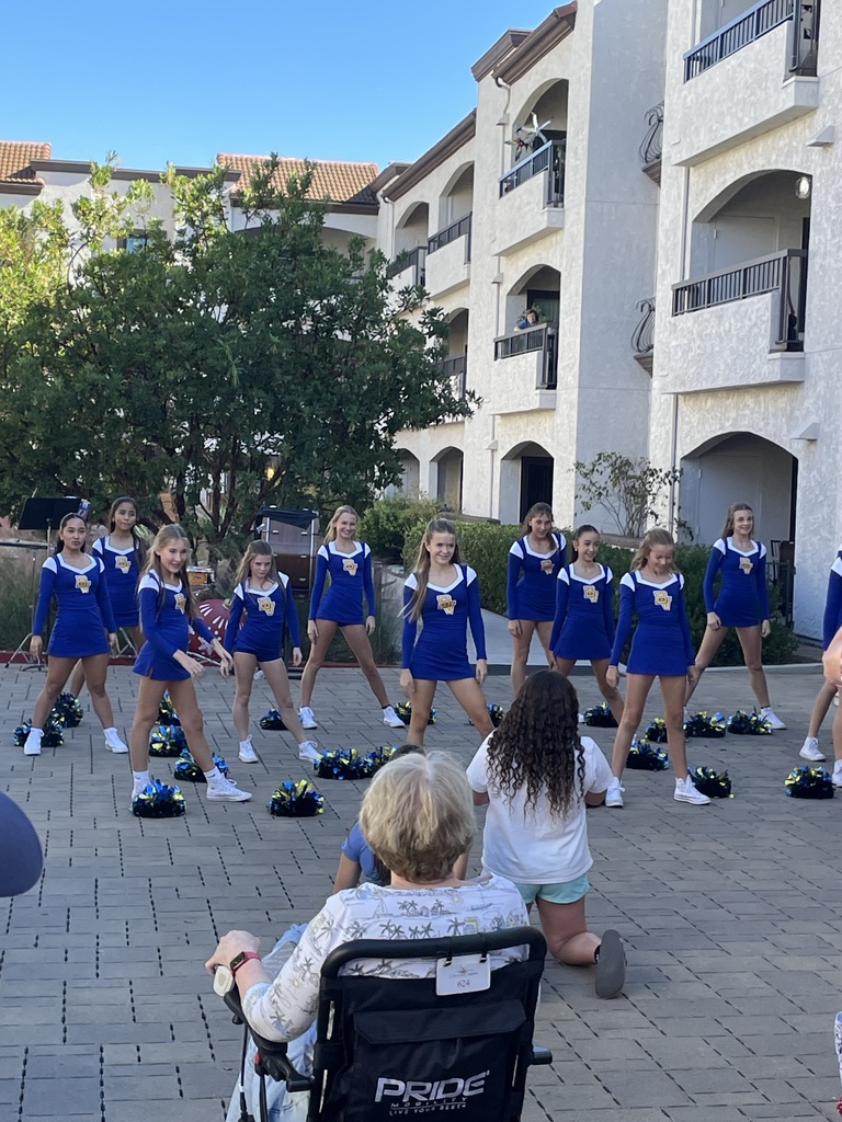 Dance team performing a senior living community
