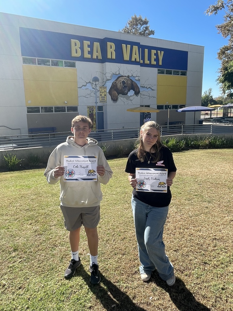 Students holding awards