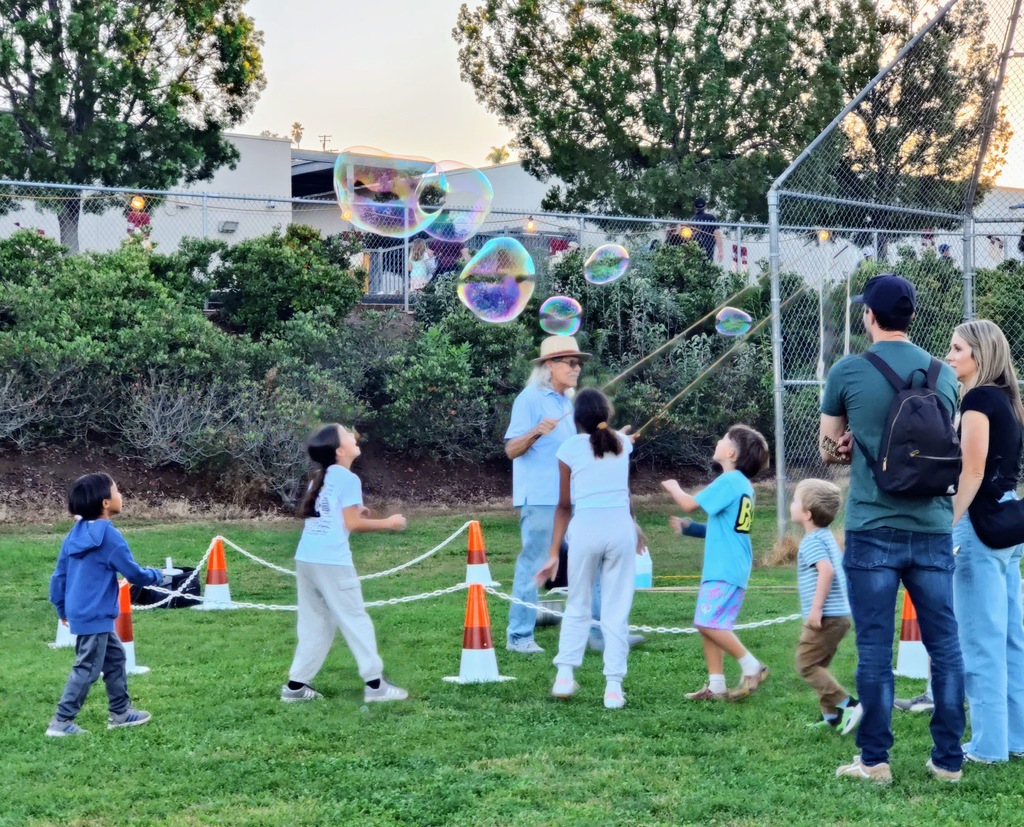 Fall Fest Bubble man making bubbles for kids