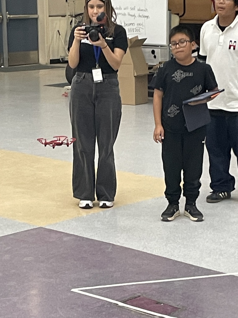 Student flying a drone